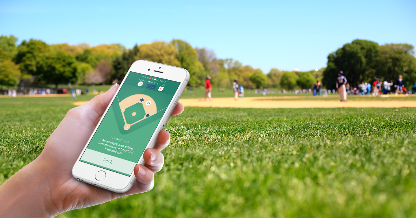 Youth baseball player checking the BASIQs app in the field